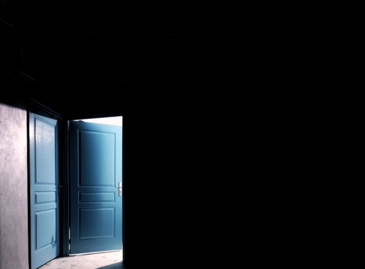blue door on concrete wall