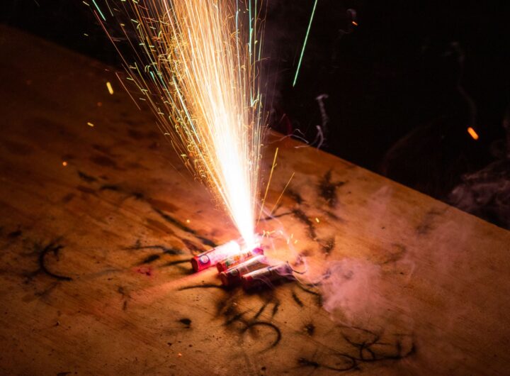 firecrackers set off on a wooden table